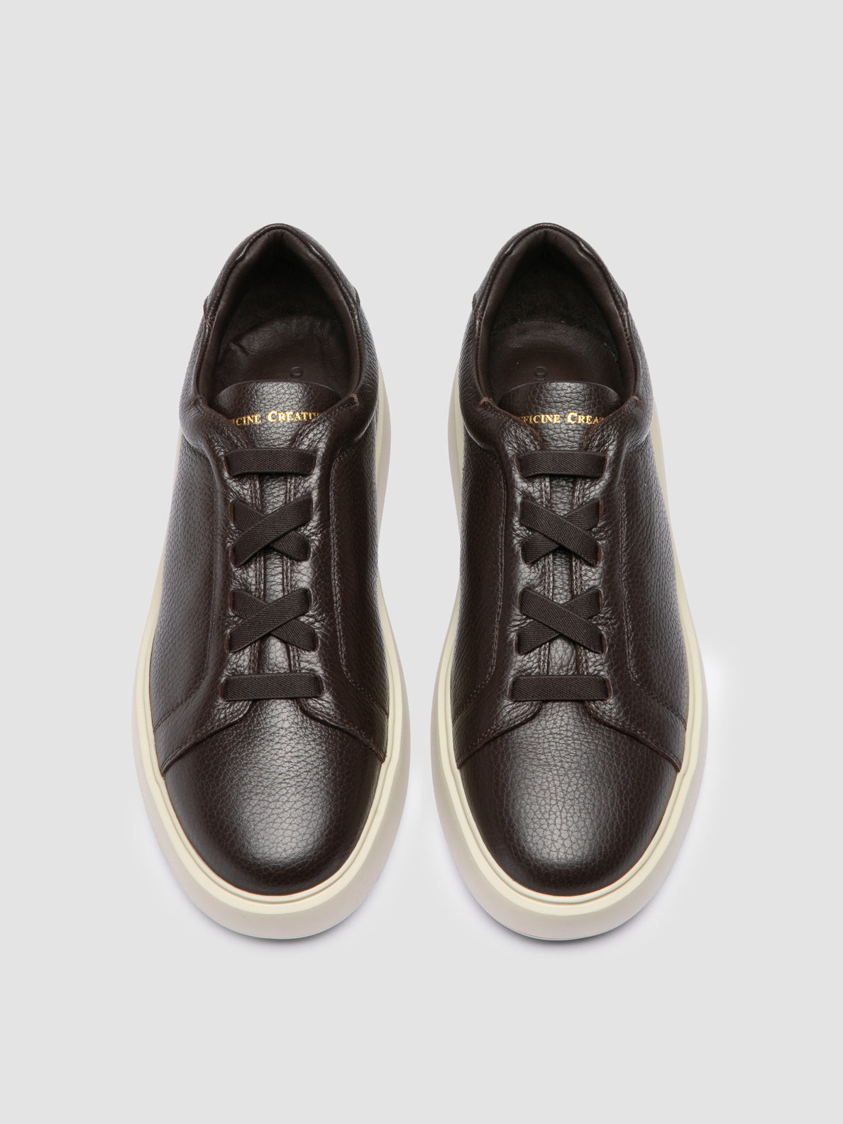 SLOUCH/001 MUFLONE EBANO_F.DO AVORIO/N