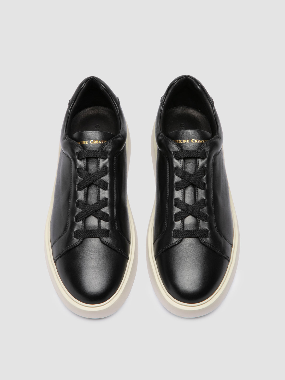 SLOUCH/001 SKIN NERO_F.DO AVORIO/N